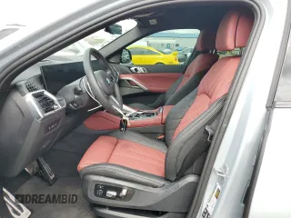 2025 BMW X6 M60i with VIN 5UX43EX06S9W68023, listed as a Copart auction lot 69874764 with 3,789 mi miles and Salvage Title. Bid and sale history available at carsss.com. Image 7.