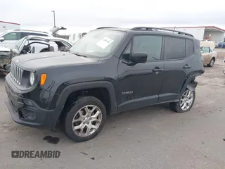 2018 Jeep Renegade Latitude with VIN ZACCJBBB4JPJ07324, listed as a IAAI auction lot 41854706 with 61,257 mi miles and . Bid and sale history available at carsss.com. Image 2.