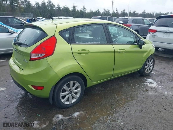 2011 Ford Fiesta SE with VIN 3FADP4EJ5BM130075, listed as a IAAI auction lot 42017406 with 112,244 mi miles. Bid and sale history available at carsss.com. Image 4.