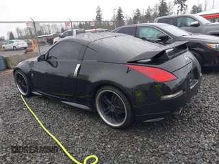 2003 Nissan 350Z Touring with VIN JN1AZ34EX3T013345, listed as a IAAI auction lot 41984329 with 102,115 mi miles. Bid and sale history available at carsss.com. Image 3.