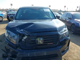 2021 Honda Ridgeline Sport with VIN 5FPYK3F14MB013671, listed as a IAAI auction lot 41361179 with 91,121 mi miles. Bid and sale history available at carsss.com. Image 12.