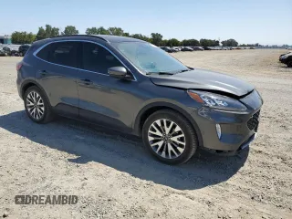 2020 Ford Escape Titanium Hybrid with VIN 1FMCU9DZ4LUA79387, listed as a Copart auction lot 62174835 with 82,486 mi miles and Salvage title. Bid and sale history available at DreamBid. Image 4.