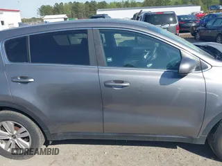 2017 Kia Sportage LX with VIN KNDPM3AC7H7166208, listed as a IAAI auction lot 41910485 with 100,211 mi miles. Bid and sale history available at carsss.com. Image 13.