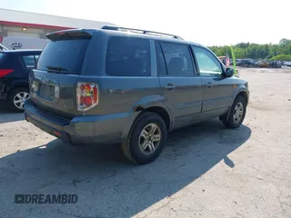 2007 Honda Pilot EX-L z VIN 2HKYF18677H504266, wystawiony jako IAAI lot #42467499 z przebiegiem 214 717 mil mil oraz . Historia ofert i sprzedaży dostępna na DreamBid. Obrazek 4.