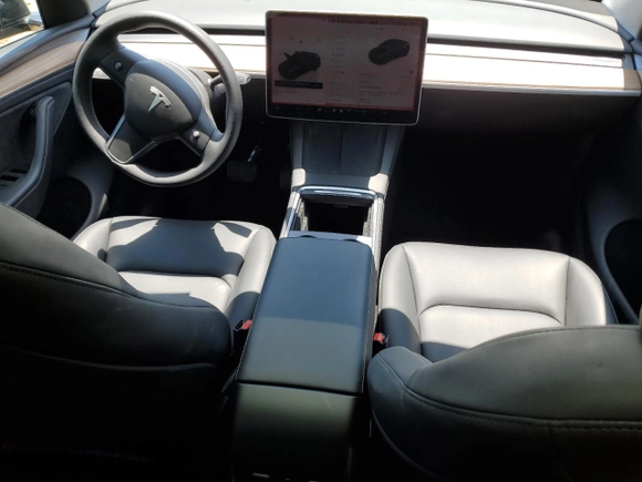2024 Tesla Model Y z VIN 7SAYGDED2RA329802, wystawiony jako Copart lot #57748805 z przebiegiem 19 391 mil mil oraz Szkoda całkowita • Salvage title. Historia ofert i sprzedaży dostępna na DreamBid. Obrazek 8.
