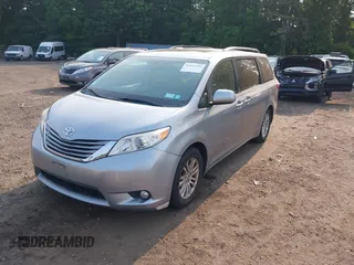 2015 Toyota Sienna XLE with VIN 5TDYK3DC2FS582546, listed as a IAAI auction lot 42443288 with 274,214 mi miles and . Bid and sale history available at DreamBid. Image 2.