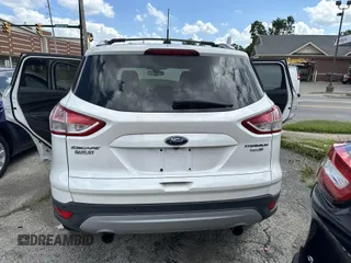 2013 Ford Escape Titanium with VIN 1FMCU9J95DUB21698, listed as a IAAI auction lot 42694998 with 170,593 mi miles and . Bid and sale history available at DreamBid. Image 12.