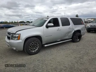 2013 Chevrolet Suburban LS with VIN 1GNSKHE77DR311408, listed as a Copart auction lot 59977394 with 216,161 mi miles and Salvage Title. Bid and sale history available at carsss.com. Image 1.