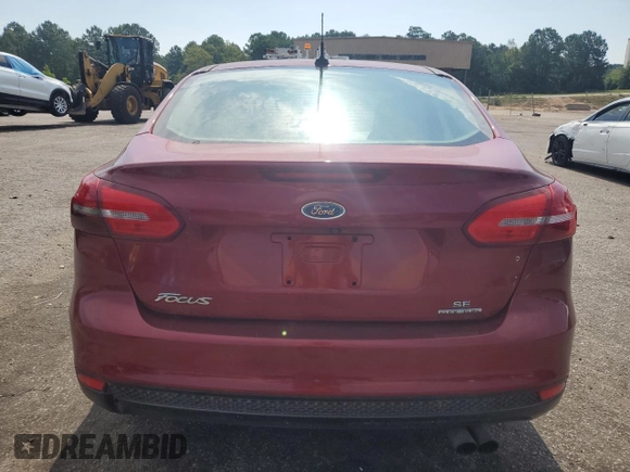 2015 Ford Focus SE with VIN 1FADP3F24FL311323, listed as a Copart auction lot 62958995 with 140,097 mi miles and Clean title. Bid and sale history available at DreamBid. Image 6.
