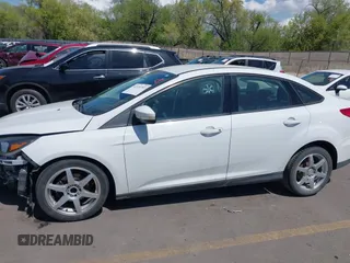 2017 Ford Focus SE with VIN 1FADP3F24HL232527, listed as a IAAI auction lot 42110702 with 95,327 mi miles and . Bid and sale history available at DreamBid. Image 15.