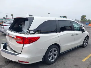 2019 Honda Odyssey EX with VIN 5FNRL6H58KB089810, listed as a IAAI auction lot 42510301 with 38,615 mi miles and . Bid and sale history available at DreamBid. Image 4.