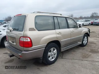 1999 Lexus LX 470 z VIN JT6HT00W8X0045705, wystawiony jako IAAI lot #42005587 z przebiegiem 443 758 mil mil oraz . Historia ofert i sprzedaży dostępna na DreamBid. Obrazek 4.