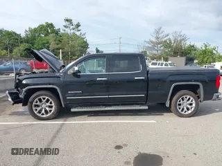 2014 GMC Sierra 1500 SLT with VIN 3GTU2VEC9EG428809, listed as a IAAI auction lot 42780648 with 170,828 mi miles and . Bid and sale history available at DreamBid. Image 14.