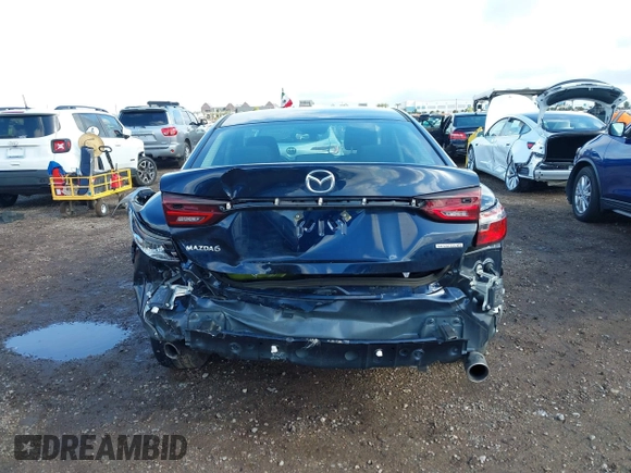 2020 Mazda 6 Sport with VIN JM1GL1UM5L1519519, listed as a IAAI auction lot 41920571 with 59,378 mi miles and . Bid and sale history available at DreamBid. Image 17.