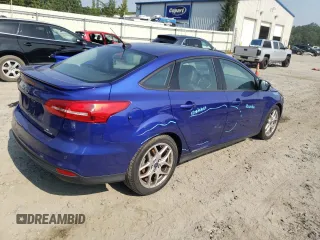 2015 Ford Focus SE with VIN 1FADP3F2XFL299193, listed as a Copart auction lot 59744715 with 141,317 mi miles and Salvage title. Bid and sale history available at DreamBid. Image 3.