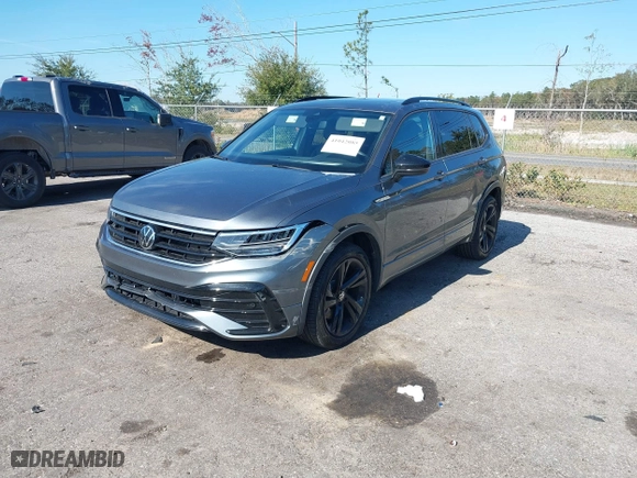 2023 Volkswagen Tiguan SE R-Line Black with VIN 3VVCB7AX7PM132001, listed as a IAAI auction lot 41042085 with 15,007 mi miles. Bid and sale history available at carsss.com. Image 18.