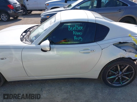 2020 Mazda MX-5 Miata Grand Touring с VIN JM1NDAM73L0414658, выставлен на аукционе IAAI как лот 42451595 с пробегом 73 339 миль миль и . История ставок и продаж доступна на DreamBid. Изображение 14.