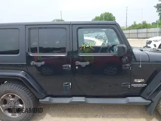 2014 Jeep Wrangler Unlimited Sahara with VIN 1C4HJWEG8EL292835, listed as a IAAI auction lot 42705672 with 176,769 mi miles and . Bid and sale history available at DreamBid. Image 14.