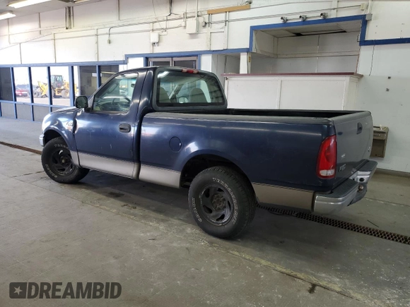 2003 Ford F-150 XL with VIN 1FTRF17293NA60031, listed as a Copart auction lot 55433885 with 186,557 mi miles and Salvage title. Bid and sale history available at DreamBid. Image 2.