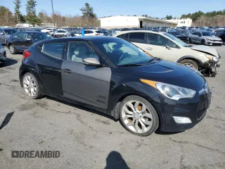 2013 Hyundai Veloster w/Black Int z VIN KMHTC6AD5DU173029, wystawiony jako Copart lot #52587455 z przebiegiem 161 716 mil mil oraz Czysty tytuł • Clean title. Historia ofert i sprzedaży dostępna na DreamBid. Obrazek 4.