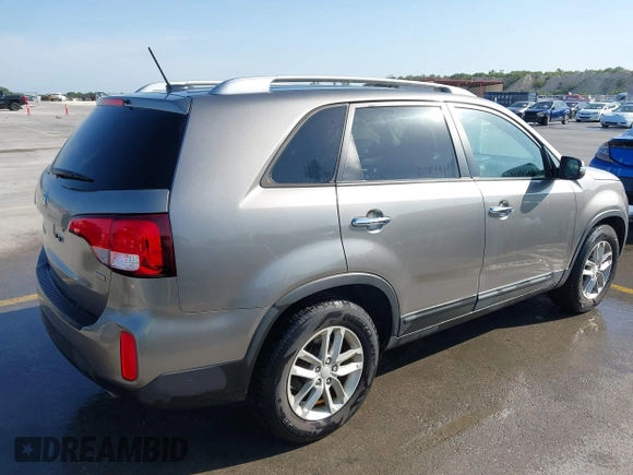 2014 Kia Sorento LX with VIN 5XYKT4A67EG528288, listed as a IAAI auction lot 42036077 with 67,835 mi miles. Bid and sale history available at carsss.com. Image 4.