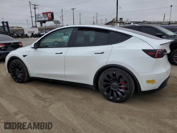 2022 Tesla Model Y Performance with VIN 7SAYGDEF1NF410241, listed as a Copart auction lot 55359505 with 42,652 mi miles and Salvage Title. Bid and sale history available at DreamBid. Image 2.