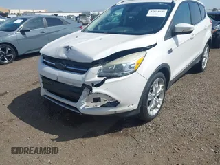 2013 Ford Escape Titanium with VIN 1FMCU0J96DUC24768, listed as a IAAI auction lot 42024198 with 93,080 mi miles. Bid and sale history available at carsss.com. Image 6.