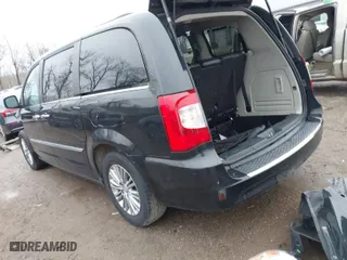 2013 Chrysler Town & Country Touring-L with VIN 2C4RC1CG8DR809559, listed as a IAAI auction lot 41468926 with 182,236 mi miles. Bid and sale history available at carsss.com. Image 3.