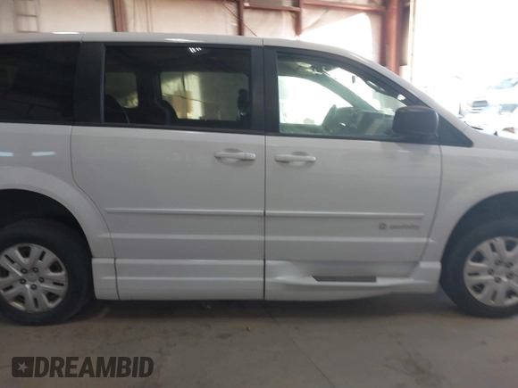 2017 Dodge Grand Caravan SE z VIN 2C4RDGBG6HR848612, wystawiony jako IAAI lot #38453498 z przebiegiem 56 964 mil mil oraz . Historia ofert i sprzedaży dostępna na DreamBid. Obrazek 13.