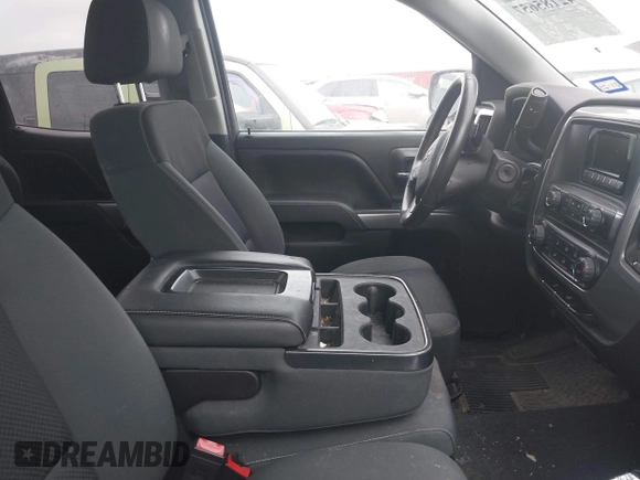 2014 Chevrolet Silverado 1500 LT with VIN 1GCRCREH5EZ371465, listed as a IAAI auction lot 42185657 with 112,151 mi miles and . Bid and sale history available at DreamBid. Image 5.