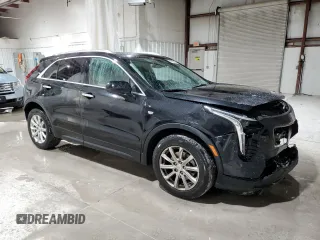 2019 Cadillac XT4 AWD Luxury with VIN 1GYFZBR46KF108585, listed as a Copart auction lot 82569994 with 67,417 mi miles and Salvage Title. Bid and sale history available at carsss.com. Image 4.