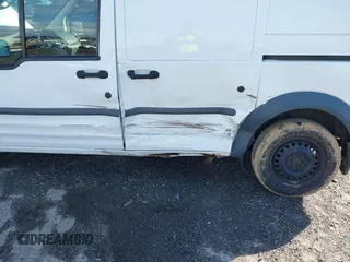 2012 Ford Transit Connect XLT z VIN NM0LS7BN7CT118474, wystawiony jako IAAI lot #41148475 z przebiegiem 139 352 mil mil oraz . Historia ofert i sprzedaży dostępna na DreamBid. Obrazek 6.