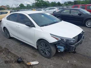 2023 Kia Forte GT-Line z VIN 3KPF54ADXPE621767, wystawiony jako IAAI lot #41991079 z przebiegiem 27 124 mil mil oraz . Historia ofert i sprzedaży dostępna na DreamBid. Obrazek 1.