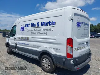 2015 Ford Transit Cargo with VIN 1FTNE2CM0FKA81175, listed as a IAAI auction lot 42550783 with 193,977 mi miles and . Bid and sale history available at DreamBid. Image 3.