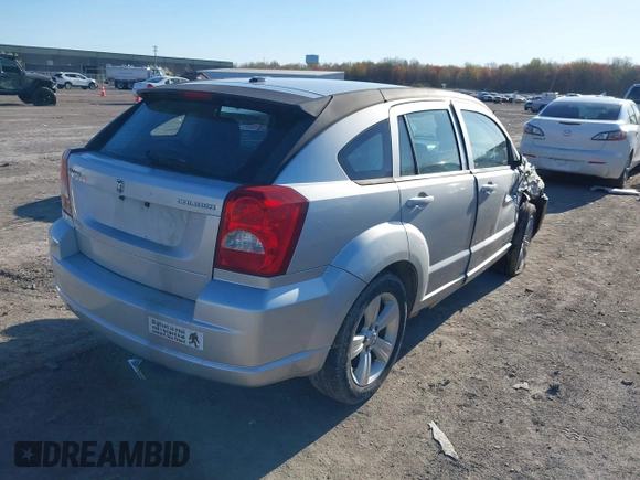 2012 Dodge Caliber SXT with VIN 1C3CDWDAXCD508338, listed as a IAAI auction lot 42091675 with 213,596 mi miles and . Bid and sale history available at DreamBid. Image 4.