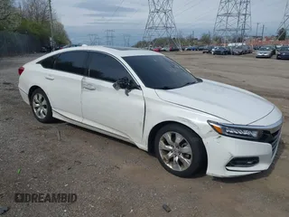 2018 Honda Accord EX-L z VIN 1HGCV1F58JA126661, wystawiony jako IAAI lot #42010812 z przebiegiem Nie podano mil oraz . Historia ofert i sprzedaży dostępna na DreamBid. Obrazek 1.