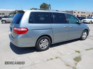 2006 Honda Odyssey EX-L z VIN 5FNRL38716B051664, wystawiony jako IAAI lot #42520320 z przebiegiem 304 835 mil mil oraz . Historia ofert i sprzedaży dostępna na DreamBid. Obrazek 4.