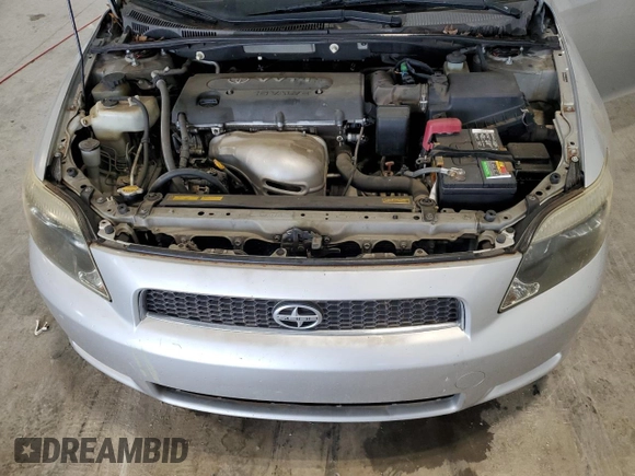 2006 Scion tC z VIN JTKDE167760090455, wystawiony jako Copart lot #54485705 z przebiegiem 161 510 mil mil oraz Szkoda całkowita • Salvage title. Historia ofert i sprzedaży dostępna na DreamBid. Obrazek 11.