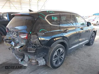 2019 Hyundai Santa Fe Ultimate with VIN 5NMS53AA3KH039879, listed as a IAAI auction lot 41223704 with 71,169 mi miles. Bid and sale history available at carsss.com. Image 4.