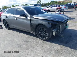 2014 Infiniti Q50 Premium with VIN JN1BV7AP7EM684448, listed as a IAAI auction lot 42564087 with 79,207 mi miles and . Bid and sale history available at DreamBid. Image 1.