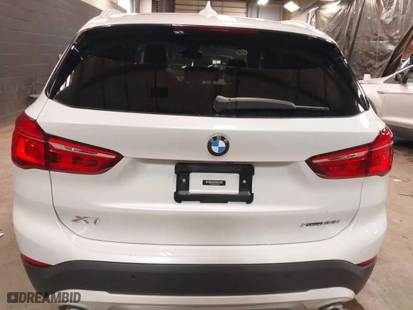 2021 BMW X1 xDrive28i with VIN WBXJG9C0XM5T76975, listed as a IAAI auction lot 41310115 with 26,869 mi miles. Bid and sale history available at carsss.com. Image 17.