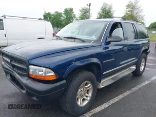 2001 Dodge Durango z VIN 1B4HS28NX1F534479, wystawiony jako IAAI lot #42245298 z przebiegiem 286 331 mil mil oraz . Historia ofert i sprzedaży dostępna na DreamBid. Obrazek 6.