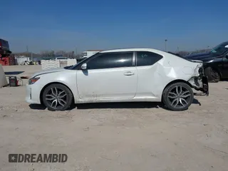 2016 Scion tC with VIN JTKJF5C70GJ019590, listed as a IAAI auction lot 41798426 with 69,045 mi miles. Bid and sale history available at carsss.com. Image 14.
