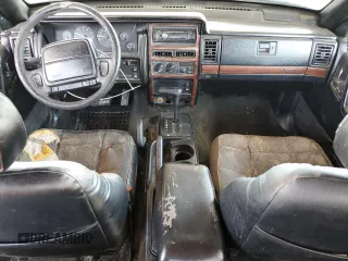 1994 Jeep Grand Cherokee Limited with VIN 1J4GZ78S5RC304501, listed as a Copart auction lot 64632335 with 184,333 mi miles and Salvage title. Bid and sale history available at DreamBid. Image 8.