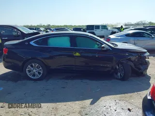 2014 Chevrolet Impala LT with VIN 2G1125S3XE9296363, listed as a IAAI auction lot 41999183 with 206,740 mi miles and . Bid and sale history available at DreamBid. Image 13.