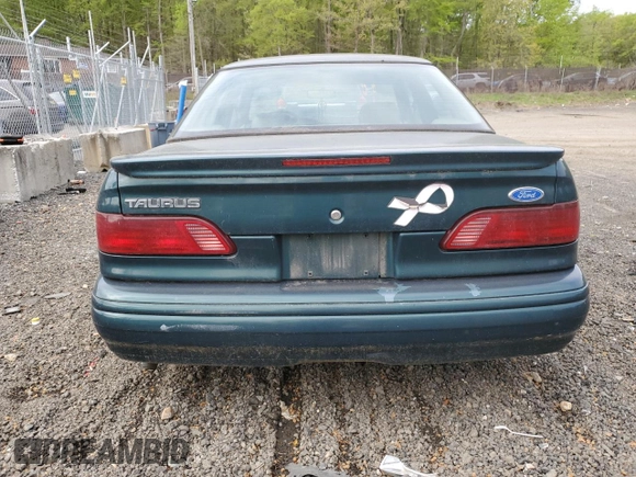 1995 Ford Taurus GL with VIN 1FALP52U8SA179395, listed as a Copart auction lot 53614265 with 71,082 mi miles and Salvage title. Bid and sale history available at DreamBid. Image 6.