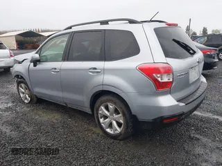 2014 Subaru Forester 2.5i Premium with VIN JF2SJAEC4EH542243, listed as a IAAI auction lot 41858364 with 100,095 mi miles. Bid and sale history available at carsss.com. Image 3.