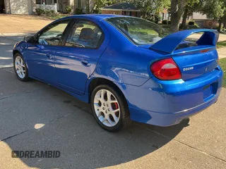 2004 Dodge Neon SRT-4 with VIN 1B3ES66S14D581763, listed as a Copart auction lot 76980654 with 76,376 mi miles and Clean Title. Bid and sale history available at carsss.com. Image 3.