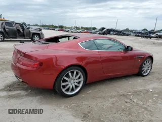 2005 Aston Martin DB9 z VIN SCFAD01A15GA00012, wystawiony jako Copart lot #65919164 z przebiegiem Nie podano mil oraz Szkody całkowita. Historia ofert i sprzedaży dostępna na DreamBid. Obrazek 3.