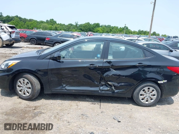 2017 Hyundai Accent SE z VIN KMHCT4AE1HU342868, wystawiony jako IAAI lot #42403205 z przebiegiem 54 890 mil mil oraz . Historia ofert i sprzedaży dostępna na DreamBid. Obrazek 14.